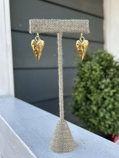 Add a touch of elegance to any outfit with our beautiful Hammered Elongated Heart Earrings. These versatile earrings are perfect for both dressy and casual occasions, making them a must-have in your jewelry collection. The unique hammered design adds a touch of texture and style!

The heart is approximately 1/2" x 1" in size.