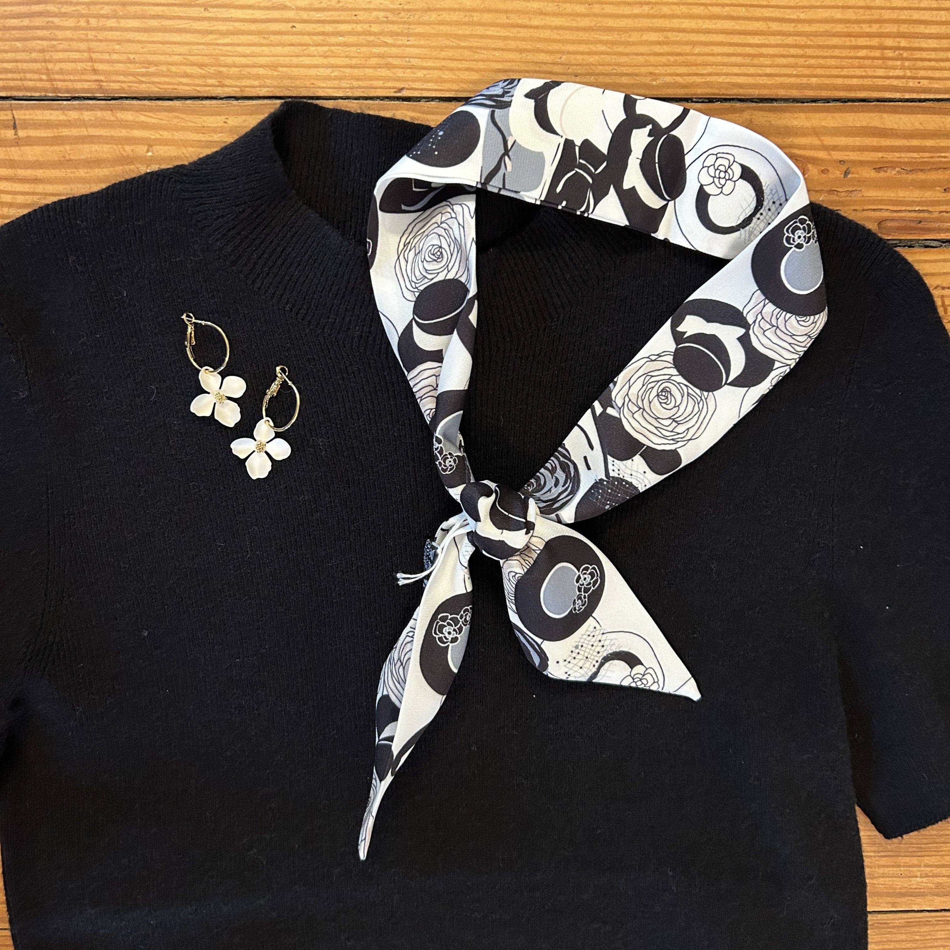 Skinny/Twilly Scarves are such a popular, fun and versatile stylish accessory! We love these in a great variety of prints, patterns and colors.&nbsp;

How to wear and use:



On Bags&nbsp;Wrap around purse handles to protect leather and add color, or tie as a decorative knot.

In Hair&nbsp;Use as a headband, tie into a ponytail bow, or braid into hair.

Around the Neck&nbsp;Style as a tight choker, a loose knot, a simple loop, or a bow.

On the Wrist&nbsp;Wrap it around your wrist several times like a brace