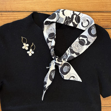 Skinny/Twilly Scarves are such a popular, fun and versatile stylish accessory! We love these in a great variety of prints, patterns and colors.&nbsp;

How to wear and use:



On Bags&nbsp;Wrap around purse handles to protect leather and add color, or tie as a decorative knot.

In Hair&nbsp;Use as a headband, tie into a ponytail bow, or braid into hair.

Around the Neck&nbsp;Style as a tight choker, a loose knot, a simple loop, or a bow.

On the Wrist&nbsp;Wrap it around your wrist several times like a brace