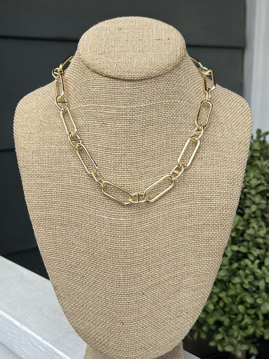 Make a statement with bold, chunky chain links in a compact silhouette. This gold necklace works beautifully on its own for understated charm or stacked with delicate pieces for modern dimension. A go-to casual essential that elevates any wardrobe without demanding attention.

Approximate Length: 16-19"

Note: Silver N' Accessories jewelry is brass and stainless steel with rhodium and 18 KT gold plated. It's water resistant and anti tarnish, but it's recommended not to wear it in the ocean or pool.