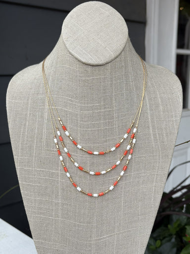 Showcase your team pride with the Duffie Triple Layer Game Day Necklace. This eye-catching layered piece features three tiers of vibrant colors designed to turn heads at the stadium or anywhere you go. The elegant construction balances bold team spirit with refined style, making it the perfect accessory for game day celebrations and beyond.