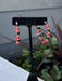 Show off your team spirit with our Game Day Hoop Earrings! Perfect for any collegiate event, these fun earrings are a must-have for any fan. Beautiful faceted black and red beads alternated with small gold beads. So pretty! Join in on the fun and show your true colors with our Game Day Hoop Earrings!