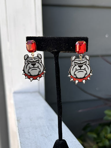 Show your team spirit with these Game Day Bulldog Post Earrings. Featuring a charming bulldog, these earrings are perfect for game day celebrations and showing your pride year-round. The classic post style offers comfortable, everyday wear while making a spirited statement. Whether you're cheering from the stands or showing support around town, these fun earrings bring playful team pride to any outfit.