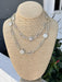 This long silver necklace combines understated sophistication with eye-catching sparkle. Square crystal accents add dimension and light-reflecting beauty to an otherwise minimal design, creating a piece that works with virtually any outfit. Whether worn layered with other pieces or as a standalone statement, it brings refined elegance to your jewelry collection.

Wear it long or short!

Approximate length: 34"