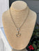 Add a touch of elegance to any outfit with our Gold Snaffle Bit Necklace w/ Rhinestone Accent! The snaffle bit design is so popular and fun. Great for the equestrian enthusiast. Perfect statement piece for any occasion – dressy or casual.

Approximate length: 18-20"
