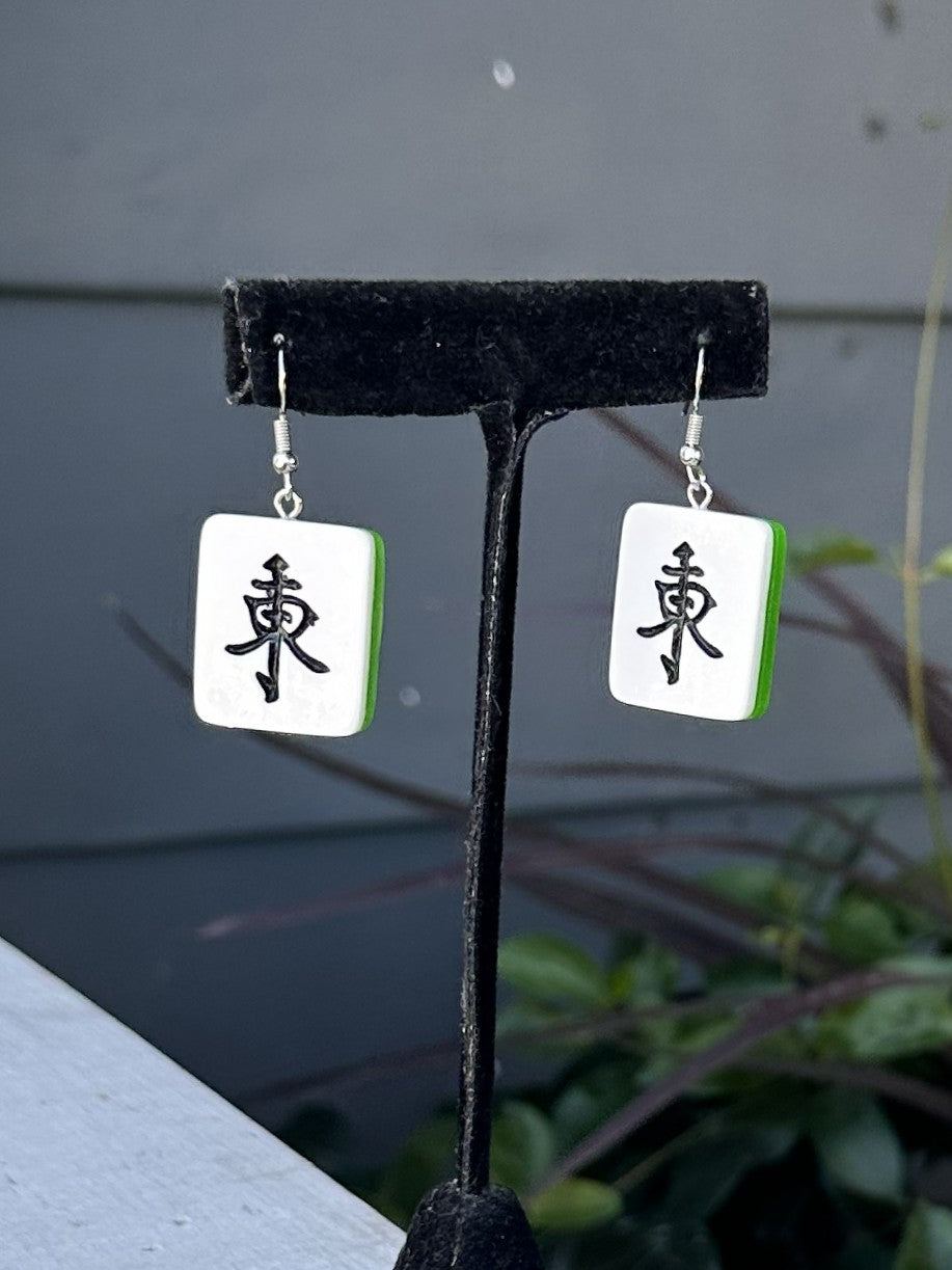 Show off your love for the game with these vibrant Mahjong Tiles Acrylic Earrings! Featuring iconic tile designs, these lightweight earrings bring playful charm to any outfit. Perfect for mahjong enthusiasts who want to celebrate their favorite pastime in style. Whether you're heading to game night or just want to spark conversations with fellow players, these fun earrings are a must-have for any mahjong lover's collection.

Size: 1" in length