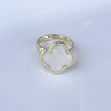 Elegant mother of pearl clover-shaped ring with adjustable sizing for a perfect fit. The lustrous pearl inlay catches the light beautifully, making it equally at home with casual everyday wear or dressed-up occasions. The timeless clover design adds a touch of sophistication to any jewelry collection.