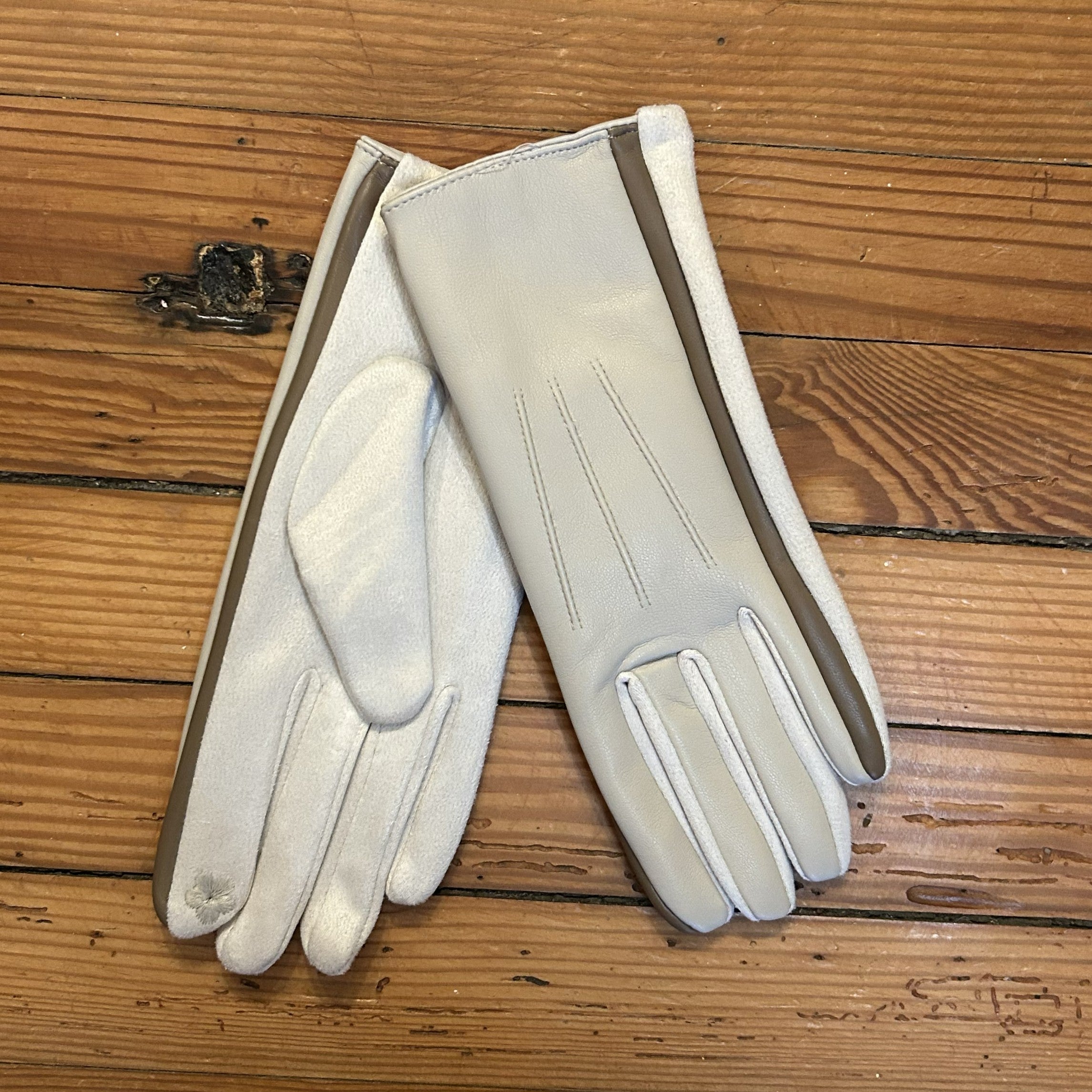 Warm, fashionable and comfortable, these gloves will keep you cozy and warm on the coldest of days! And, they are all smart phone friendly, so you don't have to remove your glove to use your phone or other touch screen devices. Gloves are one of our best sellers and we pride ourselves on having a great variety of colors and patterns. You will definitely find the perfect pair (or two!) for everyone on your gift list!

Glove are one size fits most and some run larger than others. Available in an array of diff