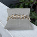 Enhance your accessory collection with this versatile Gold &amp; Silver Beaded Stretch Bracelet Set. Featuring a stunning mix of 3mm and 5mm beads in complementary gold and silver tones, this set offers endless styling possibilities. Wear each bracelet solo for a subtle accent or stack them together for a bold, layered look. The stretchy design ensures a comfortable fit for all wrist sizes, making it the perfect everyday piece that transitions seamlessly from casual to dressed up.