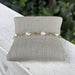 Elegant freshwater pearl bracelet featuring lustrous pearls paired with warm gold-tone chains. This timeless piece effortlessly transitions from everyday wear to special occasions. The adjustable length ensures a comfortable fit for any wrist, making it a versatile addition to your jewelry collection. Perfect for layering or wearing solo.