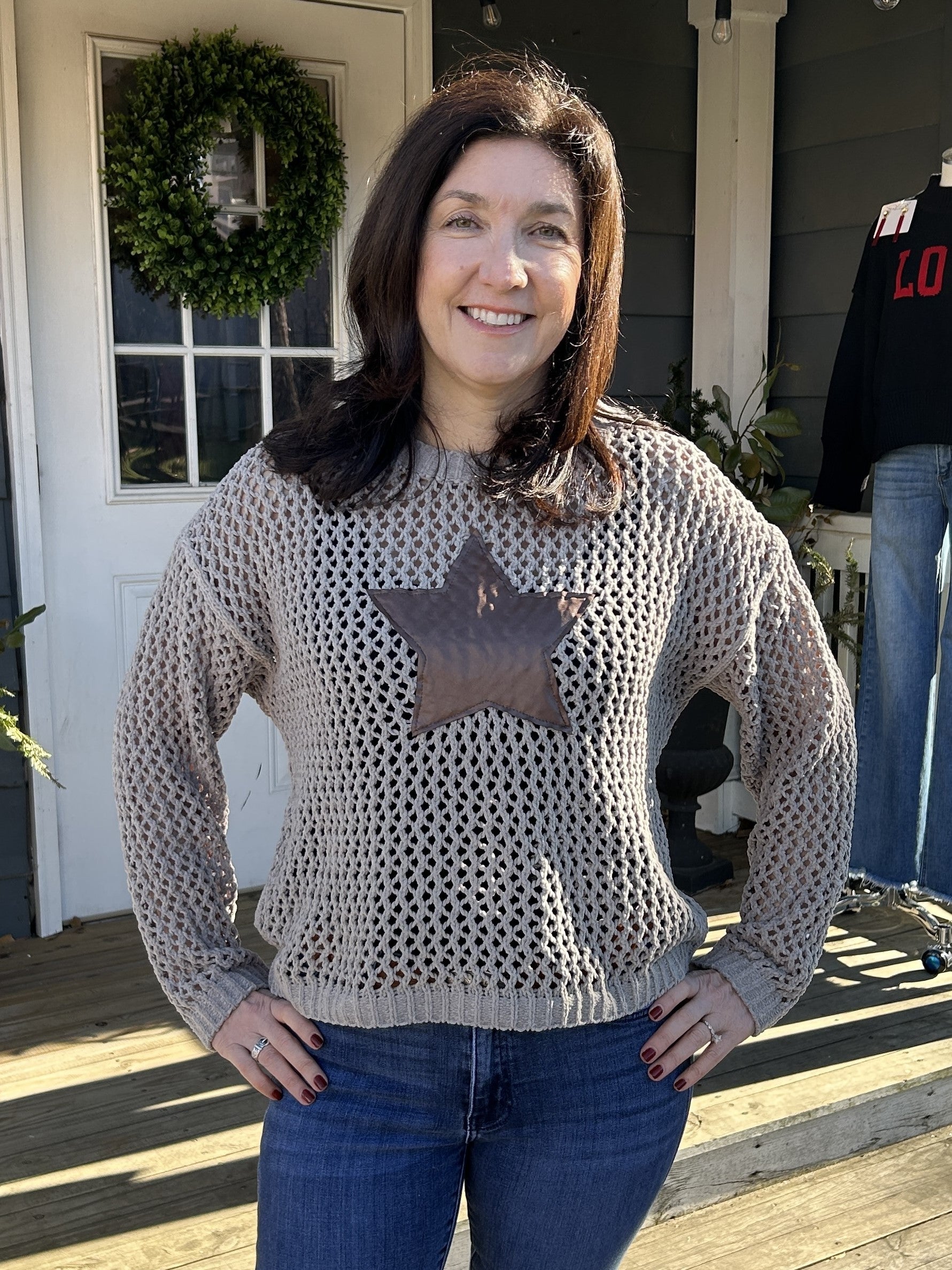 Wrap yourself in cozy comfort with our Star Accented Crocheted Sweater! This lovely sweater features a beautiful crocheted design and is so very soft to the touch. The star applique adds a touch of fun.&nbsp;

Material: 100% Polyester

Care Instructions: Hand wash cold, line dry