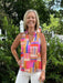 Enhance your wardrobe with this vibrant sleeveless top featuring a striking multi-colored block design. The V-neckline and ruffled collar add feminine charm, while the lined construction ensures a polished fit. Versatile enough for both dressy occasions and casual outings, this piece showcases a beautiful blend of colors that brings energy and style to any look.

Material: 98% Polyester / 2% Spandex

Care Instructions: Gentle cool hand wash cold, dry flat