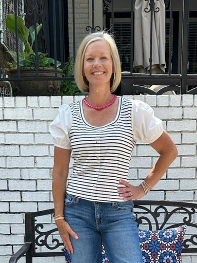 Celebrate your patriotic spirit in this charming striped knit top. Featuring classic navy and white stripes with delightful short puffed sleeves and a flattering U-neckline, this piece is perfect for summer gatherings and holiday festivities. The breathable, lightweight fabric keeps you comfortable all day long, making it an ideal choice for warm weather styling.

Material: 60% Rayon / 35% Polyester / 5% Spandex; Contrast: 100% Cotton

Care Instructions: Hand wash cold, hand to dry
