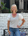 Celebrate your patriotic spirit in this charming striped knit top. Featuring classic navy and white stripes with delightful short puffed sleeves and a flattering U-neckline, this piece is perfect for summer gatherings and holiday festivities. The breathable, lightweight fabric keeps you comfortable all day long, making it an ideal choice for warm weather styling.

Material: 60% Rayon / 35% Polyester / 5% Spandex; Contrast: 100% Cotton

Care Instructions: Hand wash cold, hand to dry
