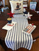 Crisp blue and white stripes bring timeless appeal to any space. This lightweight runner works beautifully for patriotic displays, spring gatherings, and summer entertaining. The whipstitched edges add refined detail and durability. Perfect for entryways, kitchens, or seasonal décor that celebrates classic American style.

Dimensions: 16 x 72 Oblong

Material: 100% Cotton

Care Instructions: Cold Hand Wash, Hang Dry, Medium Iron