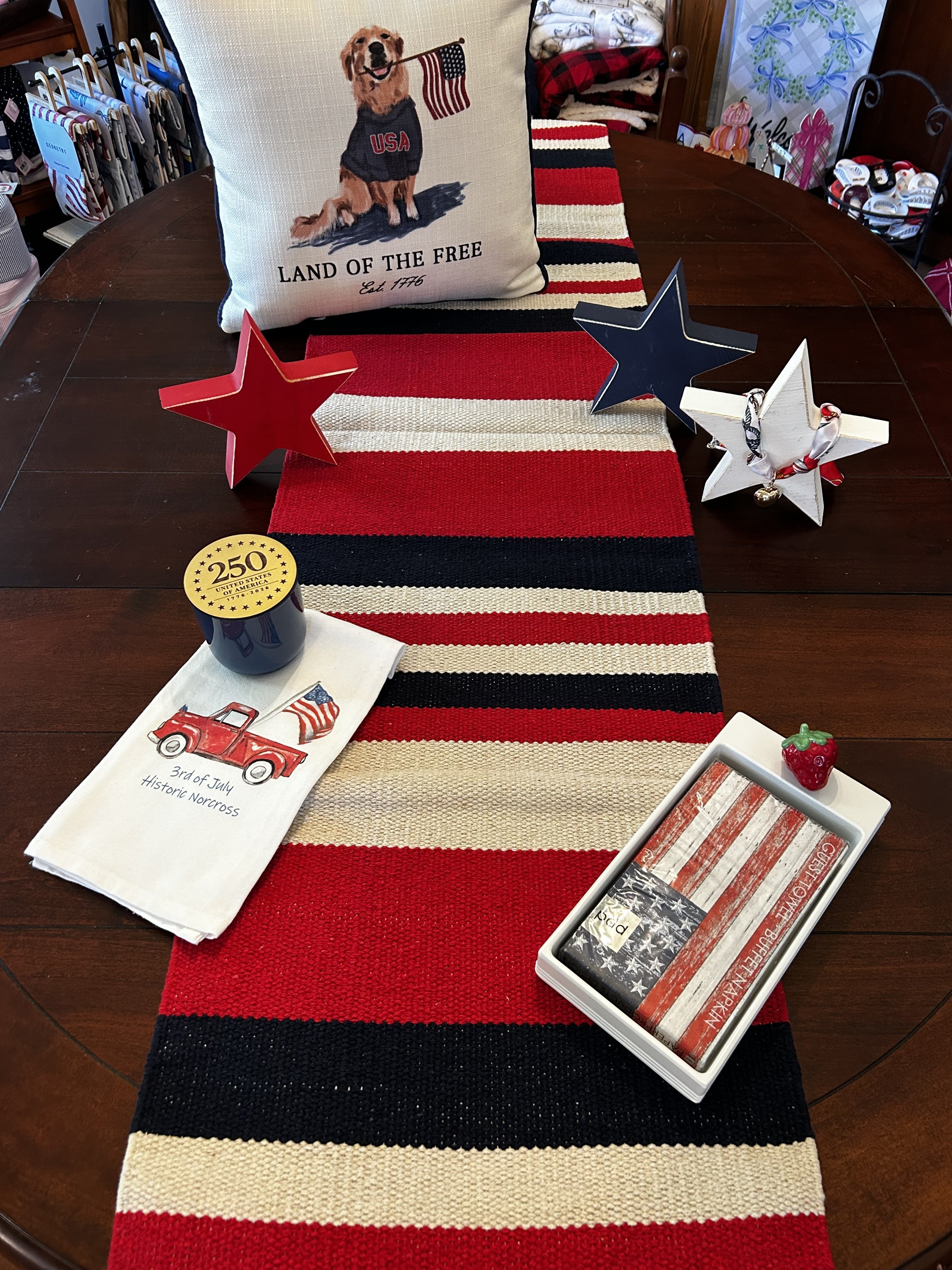 Celebrate your patriotic spirit with this charming Stripe Americana Runner. Featuring a classic red, white, and natural color palette, this versatile piece brings timeless holiday charm to any space. The decorative fringe ends add a rustic, handcrafted touch perfect for Independence Day, Memorial Day, and other patriotic occasions. An ideal accent for entryways, tables, or shelves during seasonal celebrations.

Dimensions: 16 x 72 Oblong

Material: 100% Cotton

Care Instructions: Spot clean