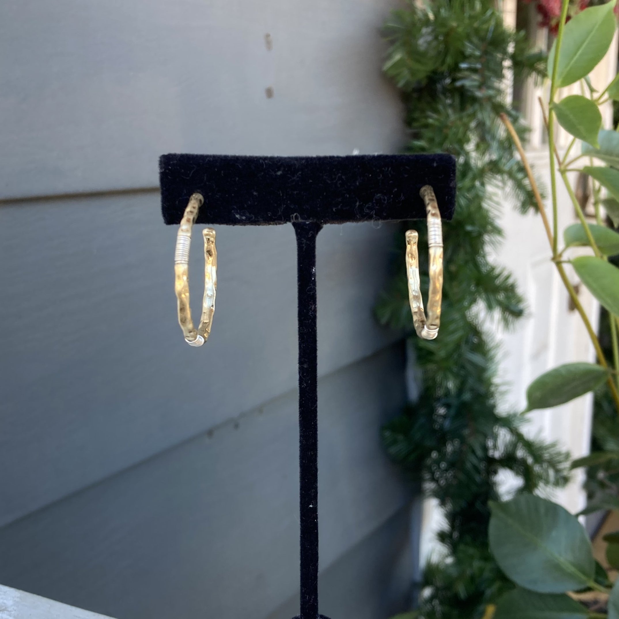 These unique Hammered Gold Hoop Earrings make a statement! Timeless and elegant, these classic gold hoops will become a staple in your collection. With its chic hammered finish, these earrings will be sure to add a bit of sparkle to any look.