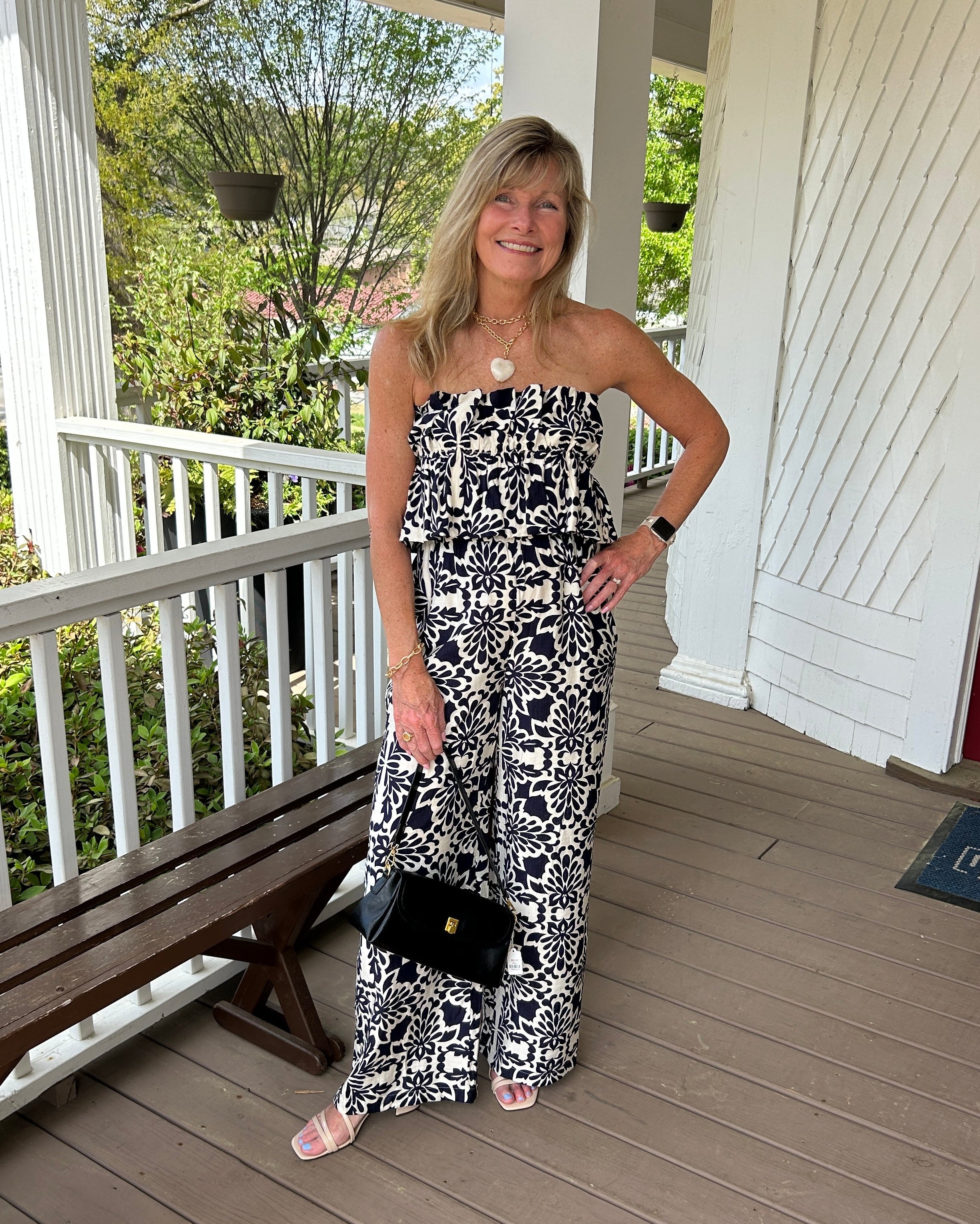 Timeless denim style with modern versatility. This sleeveless wisteria dress features a crisp light wash, flattering V-neck with collar detail, and a practical front chest pocket. The relaxed fit is so comfortable. Throw it on over a long-sleeve shirt for layered warmth or wear it bare-shouldered when temperatures climb. Whether you're pairing it with canvas sneakers for weekend errands or strappy sandals, this dress delivers effortless, go-anywhere appeal.

Tara is wearing a size Small.

Material: 100% Ten