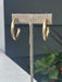 Sleek tube-shaped hoops that bring timeless elegance to any look. Available in warm gold or cool silver finishes, these earrings feature secure post backs for comfortable all-day wear. The smooth, polished design catches light beautifully, making them perfect for both everyday styling and special occasions. A versatile staple that pairs effortlessly with any outfit.