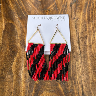 These Red &amp; Black Beaded Dangle Earrings are your go-to accessory. Crafted with precision beadwork, the bold red and black palette brings instant sophistication to game day looks, casual outings, or dressed-up evenings. Lightweight yet impactful, they deliver all the style without sacrificing comfort. Perfect for anyone seeking jewelry that balances statement-making design with practical, all-day wearability.
