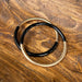The Leo Black &amp; Gold Bangle Bracelet Set brings timeless elegance to your jewelry collection. Layer these striking bangles for maximum impact or wear individually for refined simplicity. The perfect blend of black and gold creates a modern aesthetic that complements any style—from casual weekend looks to sophisticated evening wear. Effortlessly transitions from day to night, making it an essential accessory for every wardrobe.