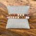 Discover effortless style with this beaded stretch bracelet set in warm earth tones. Crafted in beautiful shades of brown and beige, these bracelets offer endless styling possibilities—wear them solo for understated elegance or layer multiple pieces for a curated, bohemian aesthetic. The stretchy design provides a comfortable, secure fit that works for any wrist size. Perfect for everyday wear or special occasions, this versatile set complements any outfit and pairs beautifully with other jewelry pieces.

P