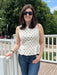 This sleeveless peplum top combines timeless style with modern flair. The cream base adorned with classic black polka dots creates an effortlessly chic aesthetic, while the flattering peplum silhouette adds dimension and curves beautifully to your frame. Fully lined for comfort and confidence, this stunning piece transitions seamlessly from casual outings to special occasions. Perfect for pairing with tailored trousers, skirts, or jeans, it's a versatile wardrobe essential that delivers both elegance and co
