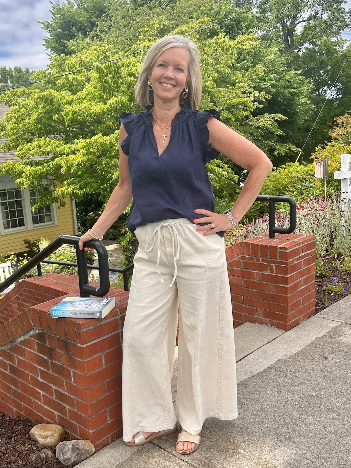 Effortless comfort meets timeless style with these wide-leg pants in soft butter cream. Featuring an adjustable elastic and drawstring waist for a custom fit, front pockets for practicality, and striking vertical stitching details that add visual interest. The relaxed silhouette flatters all body types and pairs seamlessly with everything in your wardrobe—from fitted tops to oversized sweaters. Perfect for casual days when you want to look put-together without sacrificing comfort.

Barbara is wearing a size