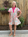 This is the perfect throw on and go dress for summer when you need to look put together but don't want to think about what to wear! We love the bright colors in the leaf print, the hot pint V-neck, and the flattering fit. It's a great length, too. The fabric is light weight and is lined, but not hot.&nbsp;


Barbara is wearing a small.&nbsp;

Material: 100% Cotton; Lining: 100% Polyester

Care Instructions: Hand wash cold, hang to dry