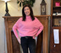 The pretty and super cozy bat wing ribbed sweater in bubble gum pink.