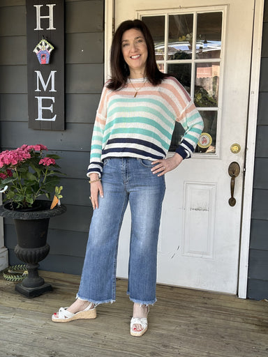 <p>This multi striped sweater is the perfect transition piece, effortlessly taking you from spring to summer and fall. Lightweight and cute, it layers well for any occasion. Add a pop of color to your wardrobe!</p> <p data-mce-fragment="1">Material:&nbsp;</p> <p data-mce-fragment="1">Care Instructions: Hand wash cold, line dry</p>