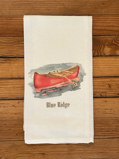 The perfect hostess gift when you visit your lake friends, or for your own lake house! Accented in the lake color of blue, this tea towel is sweet and simple with blue and brown oars.  Details:&nbsp;   ​100% Cotton Dimensions 20x25 inch