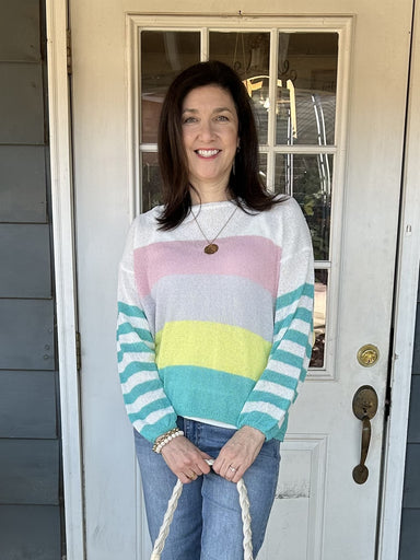 This color block lightweight sweater is the perfect transition piece, effortlessly taking you from spring to summer and fall. Lightweight and cute, it layers well for any occasion. Add a pop of color to your wardrobe!  Material: 100% Polyester  Care Instructions: Hand wash cold, line dry