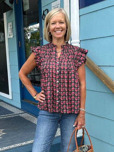 This beautiful, rich plum colored top has a gorgeous floral pattern made up of pinks and green. It is offered in THMLs best selling silhouettes, The colors make it easy to begin to look like fall even though it just has cap sleeves. We love it!&nbsp;

Material: 100% Cotton

Care Instructions: Hand wash cold separately, dry flat