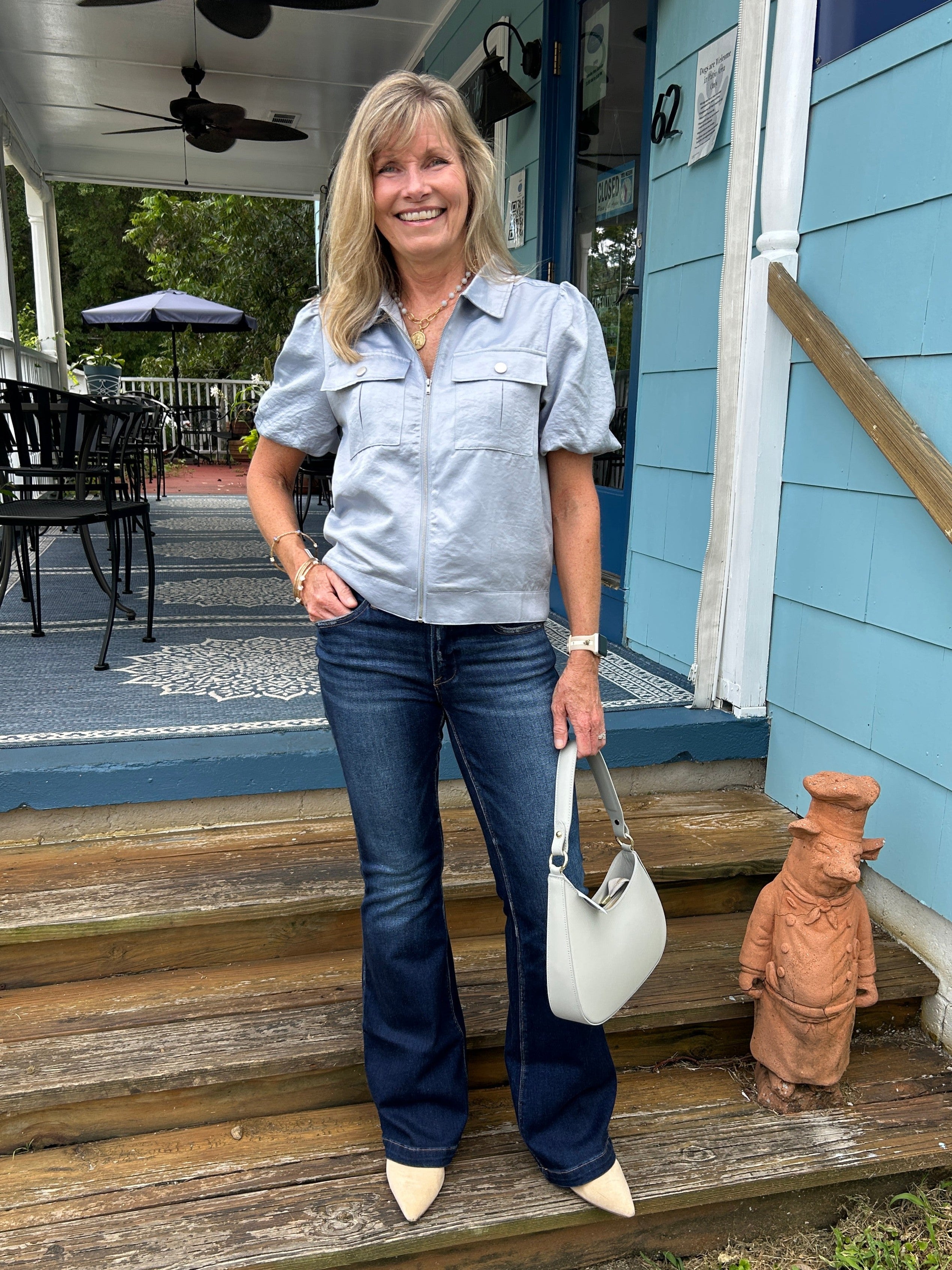 How beautiful is the jacket / top?! We love the gorgeous blue color, the soft material with it's slight sheen, the fabulous colar and slightly puffed sleeves! It zips to be your top, or you can layer it and wear it as a jacket. It will become one of your season favorites, for sure!

Taupe willl be coming later in the season.&nbsp;

Carolee is wearing a Small. She paired it with our Risen flare jeans and some awesome jewelry!&nbsp;

Material: 90% Polyester / 10% Nylon

Care Instructions: Dry clean.&nbsp;