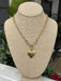 This stunning Chunky Chain w/ Hammered Heart Pendant is the perfect addition to any outfit with its beautiful gold color. The prominent heart pendant adds a touch of elegance and the clasp closure ensures a secure fit. Complete your look with this lovely accessory.  Designed and made by local artist Approximate measurement: 18"