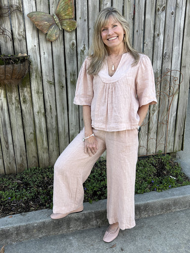 <p>Step into comfort and style with the Adrianna Linen Pants! Featuring a flattering fit and comfortable waistband, these pants are perfect for any occasion. The signature wide hems add a touch of elegance and the linen fabric brings a casual, yet lovely feel. Mix-and-match with other Linen items for a versatile and chic look.</p> <ul> <li>Classic fit. Two sizes fit most.</li> <li>Ankle-length wide-leg pants, front side pockets, elastic waistband, wide hems.</li> <li>100% Italian linen.