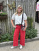 Be ready on game day with our Risen High Rise-Crop Wide Pants in vibrant scarlet red. These cropped, high-rise pants feature a wide-leg design and a stylish frayed hem for a casual yet bold look. Comfortable and easy to wear, they’re perfect for staying relaxed while showcasing your spirited style.

Carolee paired them with our Eyelet Puffed Sleeve Top, Clear Georgia "G" Game Day Bag, and Collegiate Initial Necklaces ("G).

Material: 98% Cotton / 2% Spandex

Care Instructions: Machine wash cold, hang to dry