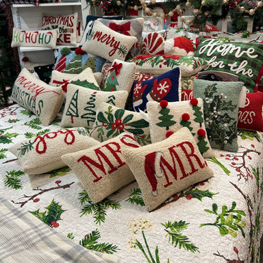 Add a festive touch to your home this holiday season with our hand hooked pillows! The velveteen backing adds a touch of luxury while the poly-fill insert ensures comfort. Make your holiday decor stand out with this accent piece.