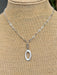 Accessorize with a unique statement piece. This 18-20" silver chain necklace is made with stylish & unique chain links and an oval drop. Stand out from the crowd with this beautiful necklace.
