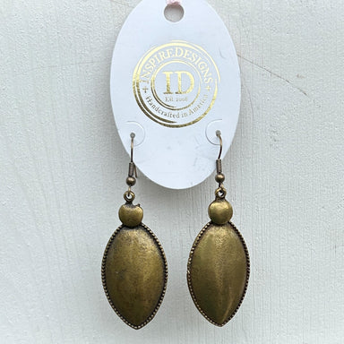These Ellipse Shaped Drop Earrings are a stylish and sophisticated choice for any occasion. The unique ellipse shape and bronze/dark gold coloring make them eye-catching and classic. These wire earrings are easy to wear.
