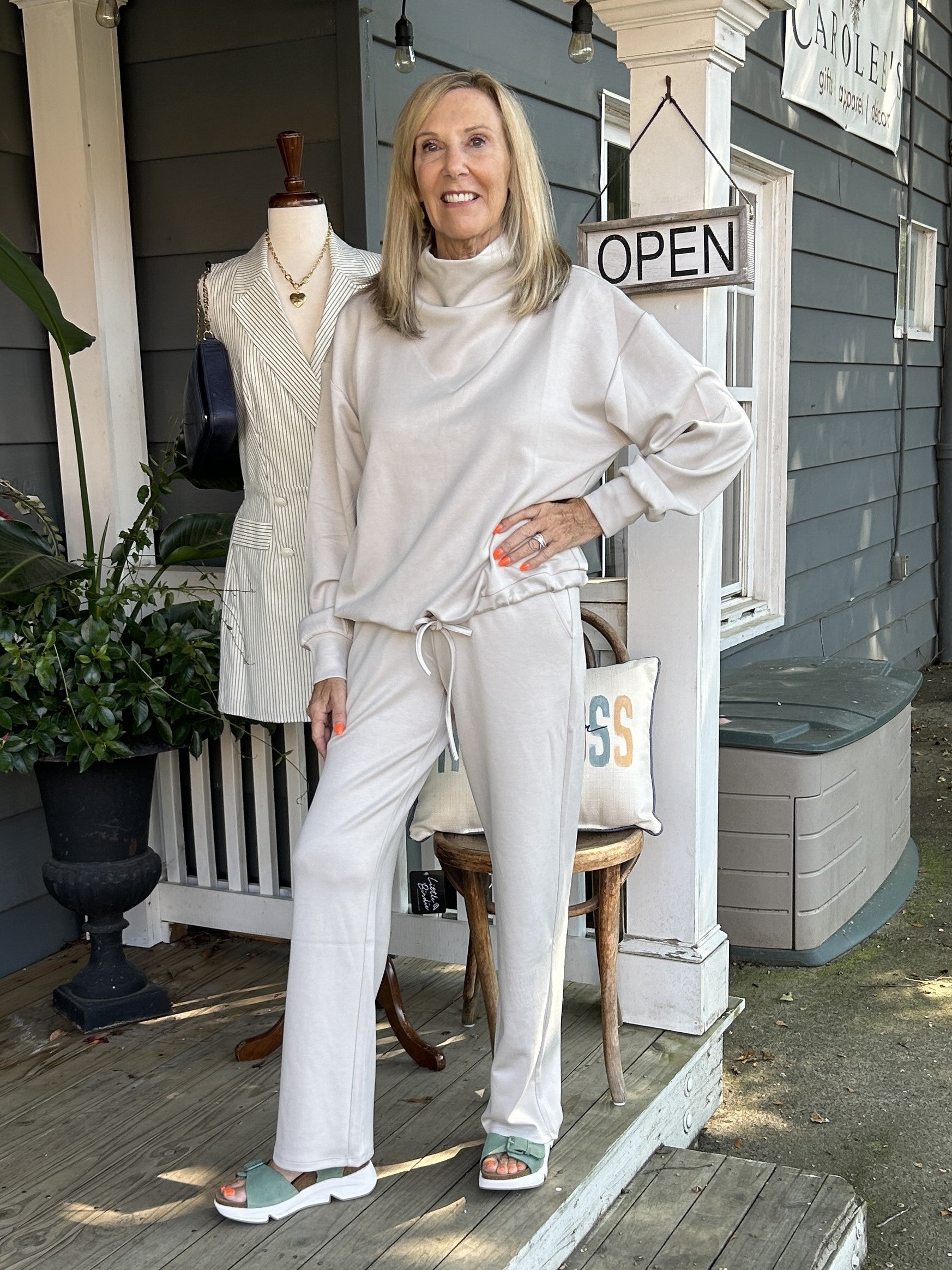 Experience the ultimate comfort with our Wide Leg Lounge Pants. Made with a soft and cozy fabric, these pants have a nice weight and transition effortlessly between fall, winter, and spring. The beautiful sand color is versatile for any outfit, making it a go-to choice. Perfect for traveling, with side slant pockets and an elastic banded waist.

Pair it with our matching "Funnel Neck Pullover Top/Sweater".

Material: 55% Rayon / 40% Polyester / 5% Spandex

Instructions: Gentle cool hand wash, dry flat