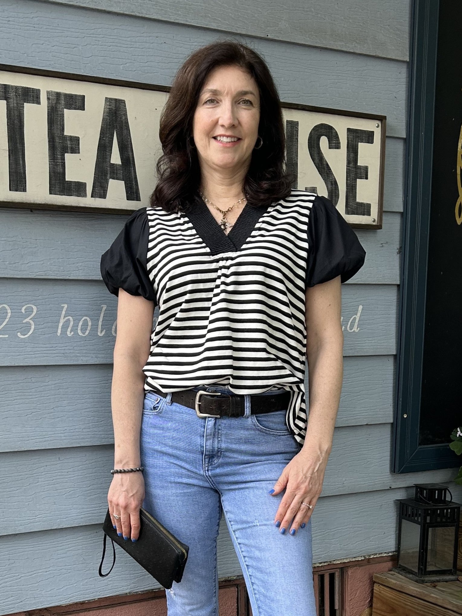 You will enjoy our Striped Puff Sleeve Top, featuring a striking black and white striped bodice.&nbsp; The contrasting colored sleeves add an unexpected twist, while the fun puffed sleeve design brings volume to your look. Pair with you favorite white or black shorts or pants.

Material: 95% Cotton / 5% Spandex

Care Instructions: Hand wash cold, hang to dry