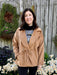 This camel-colored coat features a classic collar and a stylish tie waist, creating a flattering silhouette. Crafted from a very soft fabric, it offers both comfort and a luxurious feel. Its trendy short cut makes it a versatile piece that pairs effortlessly with any outfit, while the warm neutral tone ensures timeless elegance.

Material: 100% Polyester

Care Instructions: Hand wash on cold water, lay flat to dry