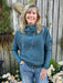 Embrace cozy elegance with this long sleeve cowl neck knit sweater in a stunning lagoon hue. Its soft, breathable fabric offers all-day comfort, perfect for casual outings or relaxing at home. The graceful cowl neck adds a touch of sophistication, making it a versatile staple.

Material: 55% Rayon / 40% Polyester / 5% Spandex

Care Instructions: Hand wash cold, hang to dry