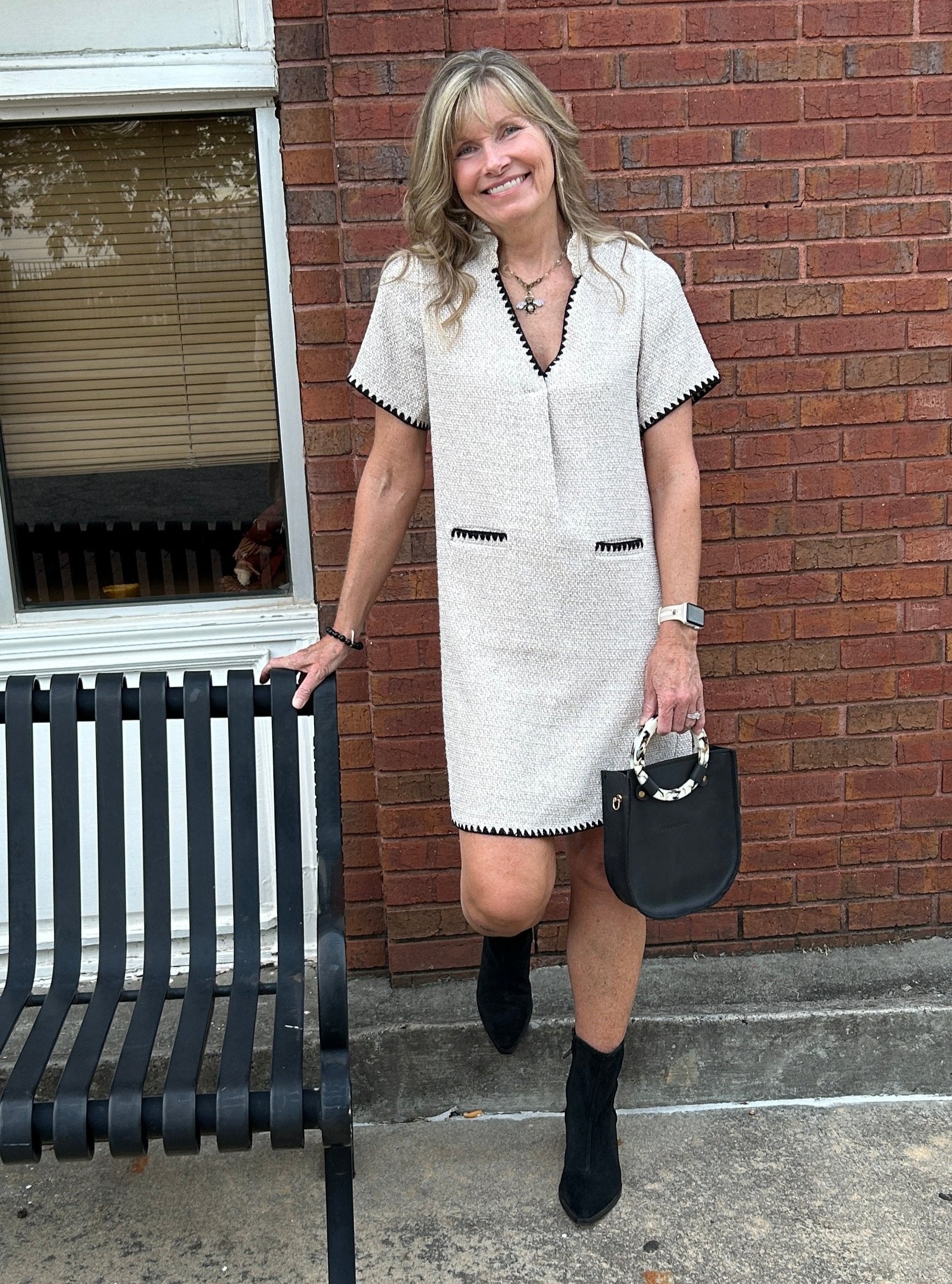 This classic fabulous short sleeve dress will become a go to this fall! The tweed fabric is surprisingly soft and we love the elevated style. It is fully lined, has pockets and runs true to size.

Carolee is wearing a small.

Material: 93% Polyester / 5% Cotton/ 2% Spandex

Care Instructions: Gentle cool hand wash cool, dry flat