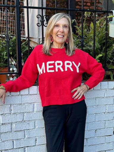 Spread holiday cheer in this vibrant red Christmas sweater featuring playful puffy letters spelling "Merry." The tactile, dimensional lettering adds a fun, festive touch that captures the spirit of the season. Perfect for holiday parties, family gatherings, or cozy winter days, this sweater combines comfort with eye-catching style. Whether you're decorating the halls or just want to wear your seasonal spirit, this cheerful piece brings instant joy and warmth to your wardrobe.

Material: 39% Acrylic / 31% Po