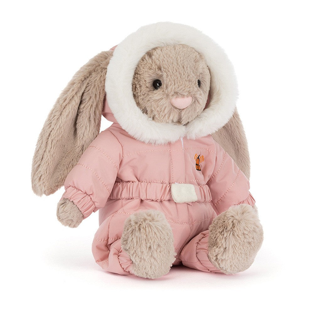 Your little one will adore Bashful Bunny Snow Suit, the perfect winter obsession for any child who loves building snowmen and making friends. This cozy and charming pink suit ensures bashful bunny stays warm and ready for all the winter adventures. Celebrate the season with comfort and style with the Bashful Bunny Snow Suit.

Details:

Dimensions:&nbsp;12.2in x 4.7in x 3.5in
Sitting Height:&nbsp;9in
Main Materials:&nbsp;Polyester
Inner Filling:&nbsp;Polyester Fibers, PE Beans
Hard Eye
Removable Clothes
Care