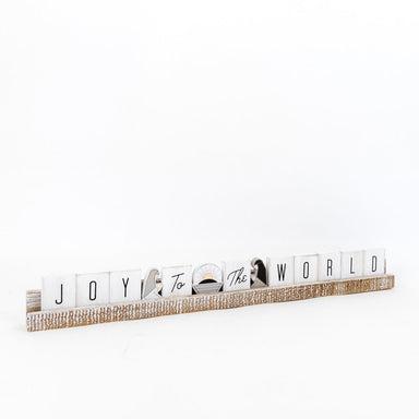 This wood tile ledge has a beautiful, seasonal saying of "Joy to the World". Use it during the holiday season, or switch out the picture tiles and use any time of the year.

This ledge can be paired with Adams' wood tiles and letters. Designing home and holiday decors for over 8 years, Adams &amp; Co has shown the world its unique style and conventional flair that can bring you any theme that you want to achieve. From seasonal decorations to traditional ornaments, we have everything you need to add life to 