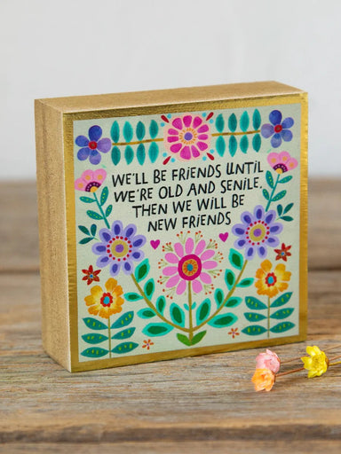 A charming wooden keepsake box that celebrates the moments and connections that matter most. This petite sign fits perfectly on shelves, desks, dressers, or anywhere you want a daily reminder of friendship and meaningful bonds. Crafted from real wood and designed to be lightweight, it's an ideal gift for someone special or a treasured addition to your own space. Small in size but big on sentiment.

Dimensions: 3in L x 3in W

Material &amp; Care: Wood